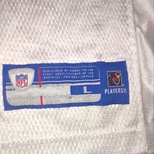 Manning # 18 Reebok man blue n white jersey size Large